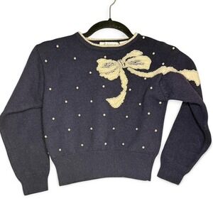 Liz Claiborne petite S or XS pearl bow on a dark blue merino wool sweater